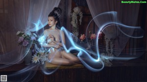 A woman in a white robe sitting on a wooden bench.